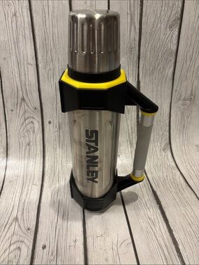 Stanley Silver Thermos with Black and Yellow Handle Accents